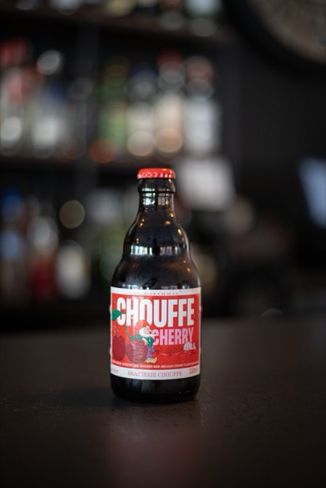 Botella de cerveza en la barra de INTI KAI