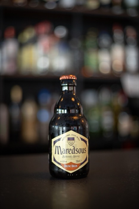 Botella de cerveza en la barra de INTI KAI